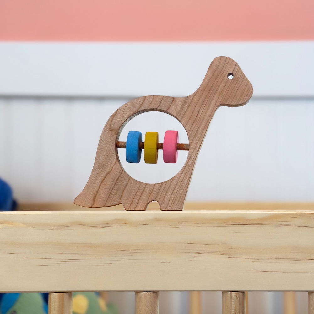 rattle shaped like a dinosaur